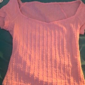 Okay so i’m selling this light pink crop top and only worn once!